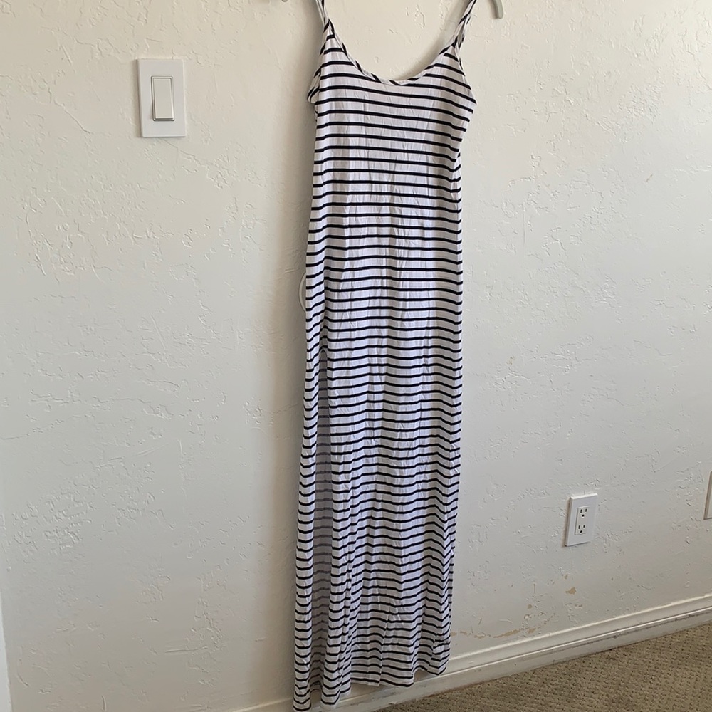 Long black and white cotton sundress with high slit on one side.